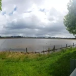 A new Lake that formed on the Trentham Road opposite the Dharma School. (Photo: Victor Szwed)