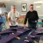 RDA Volunteers painting their Wombat Christmas Trees.