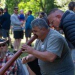 Jason Kerr plays the Didgeridoo while DJAARA CEO Rodney Carter delivers a welcome to Country. (Photo supplied)