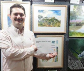 James Watson, Manager of the Community Bank Daylesford, with the $2000 Landscape prize for Helga Hart.